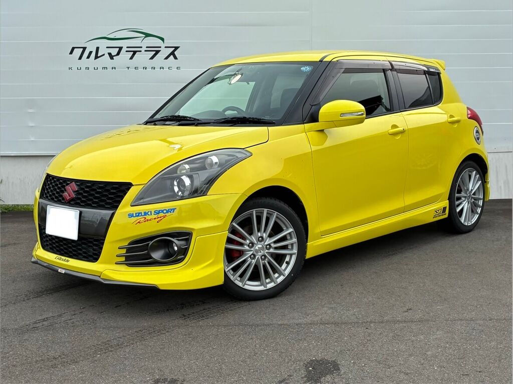 納車されたスズキ スイフトスポーツ（チャンピオンイエロー）のフロントビュー